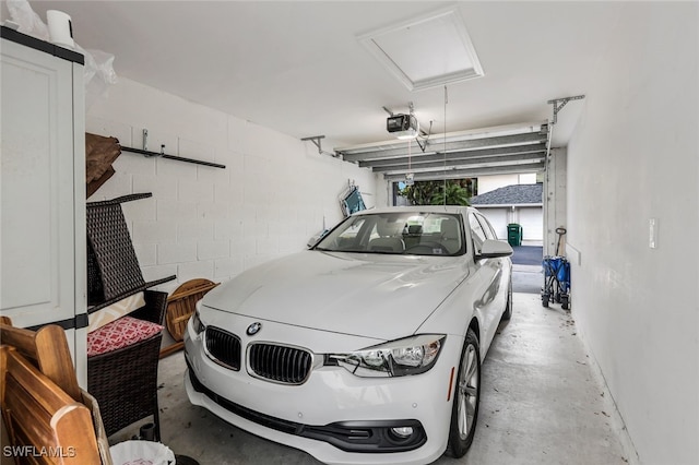 garage featuring a garage door opener