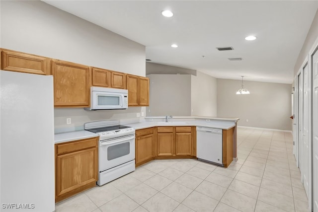 kitchen featuring white appliances, a chandelier, kitchen peninsula, sink, and decorative light fixtures