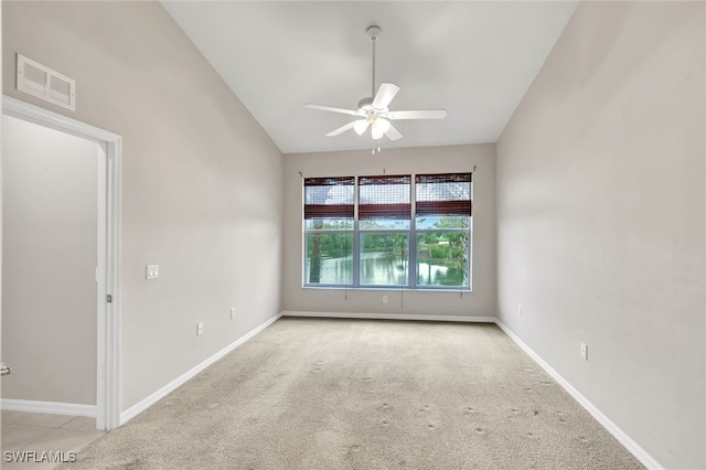 unfurnished room with light carpet and ceiling fan