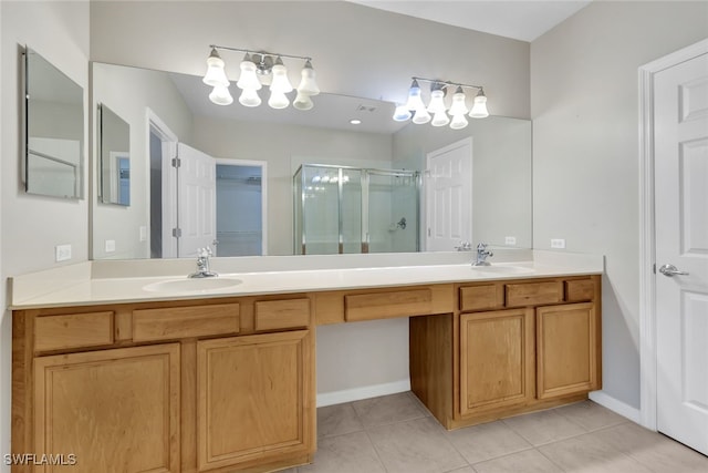 bathroom with vanity, walk in shower, and tile patterned floors