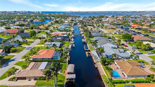 bird's eye view with a water view