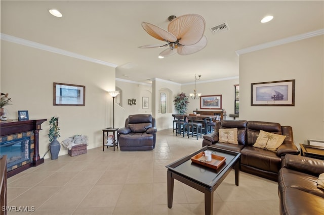 living room featuring light tile patterned floors and crown molding