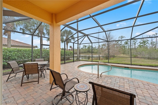 view of pool with a lanai and a patio area