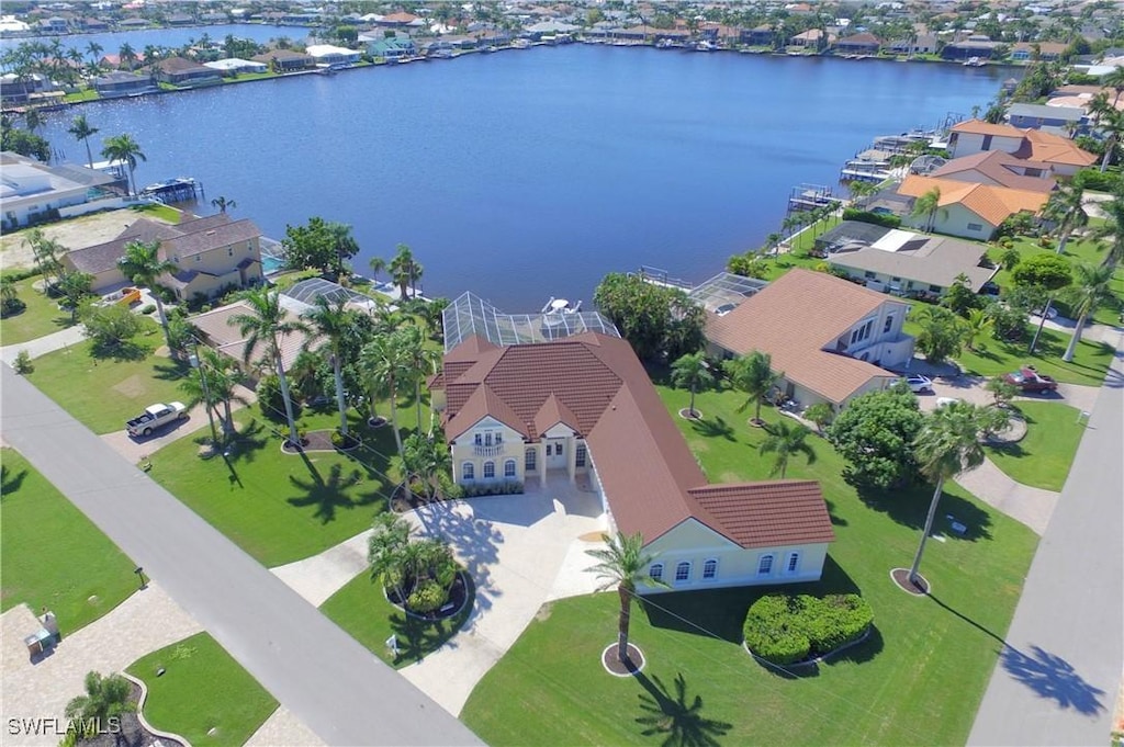 bird's eye view with a water view