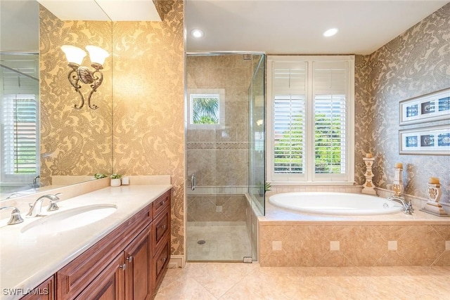 full bath with a shower stall, wallpapered walls, vanity, and a garden tub