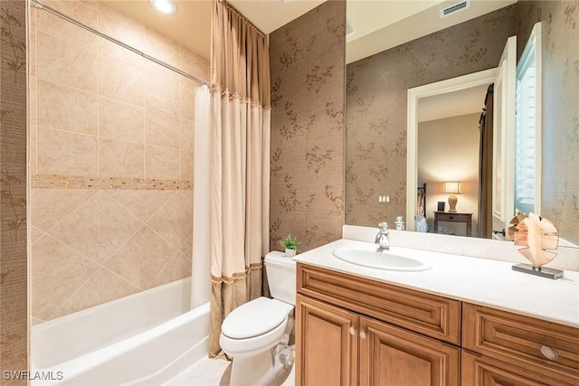 bathroom with visible vents, wallpapered walls, toilet, shower / tub combo with curtain, and vanity