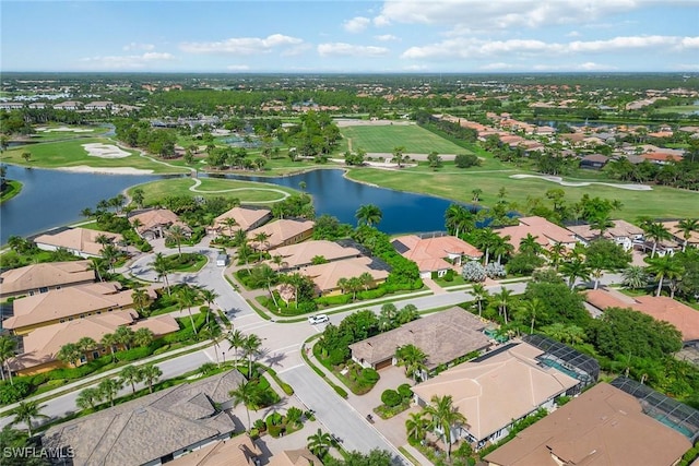 bird's eye view with a residential view, golf course view, and a water view