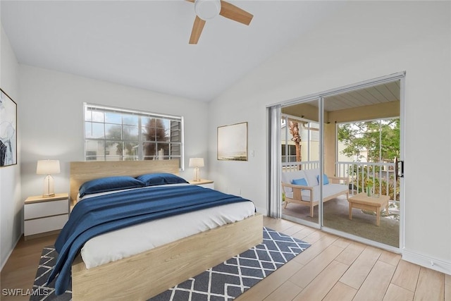 bedroom with ceiling fan, access to outside, wood-type flooring, and vaulted ceiling