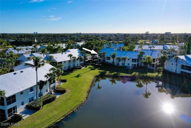 drone / aerial view with a water view