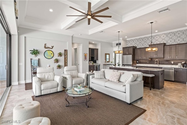 living room featuring coffered ceiling, ceiling fan, crown molding, beam ceiling, and sink