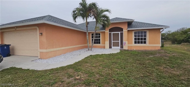 ranch-style house featuring a front lawn and a garage