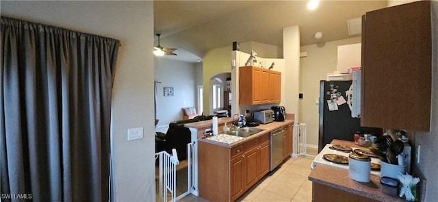 kitchen with ceiling fan, stainless steel dishwasher, fridge, sink, and light tile patterned floors