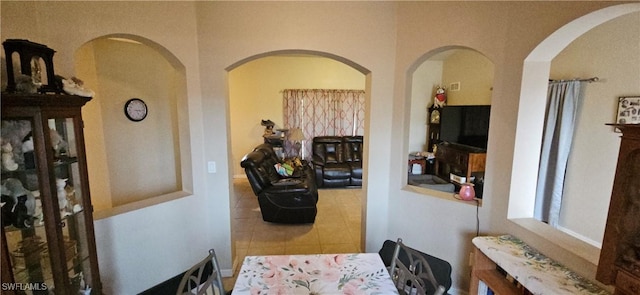 dining area with tile patterned floors