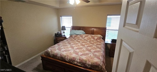 bedroom with ceiling fan and carpet floors