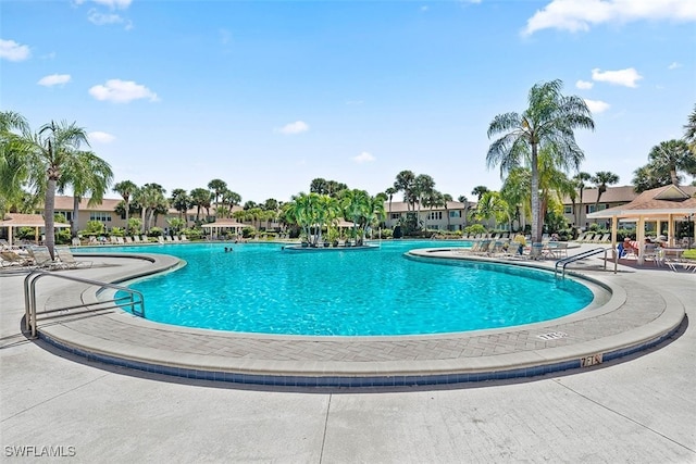 view of swimming pool featuring a patio area