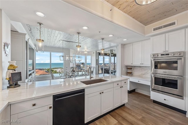 kitchen featuring dishwasher, wooden ceiling, pendant lighting, stainless steel double oven, and sink