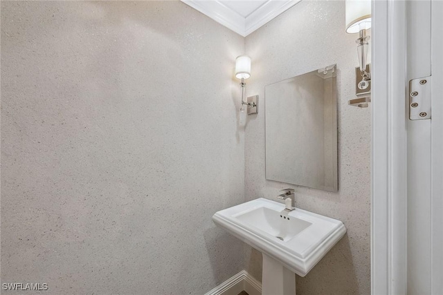 bathroom with crown molding