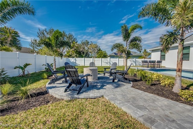 view of patio / terrace with a fenced in pool