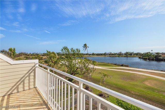 balcony featuring a water view