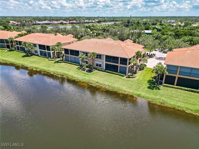 drone / aerial view with a water view