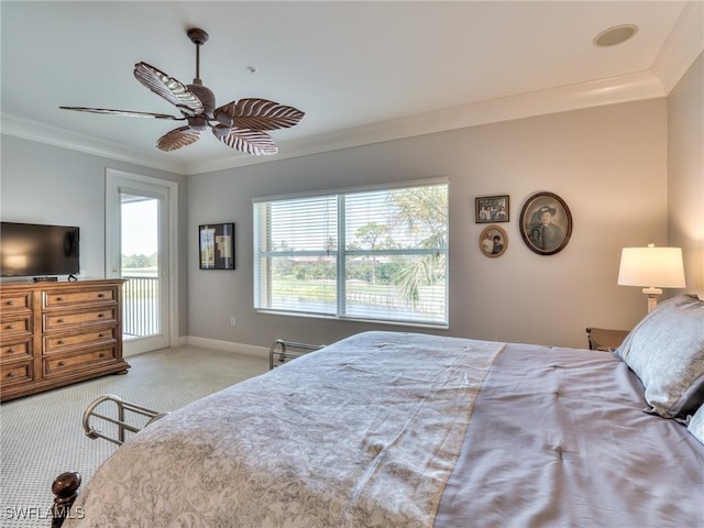 carpeted bedroom with ceiling fan, access to outside, and crown molding