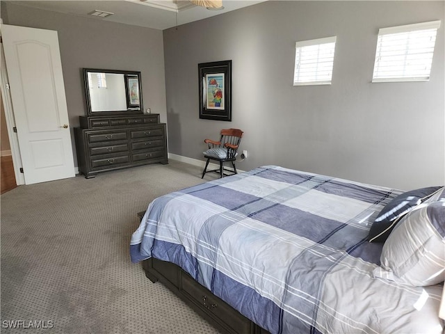 bedroom featuring light colored carpet