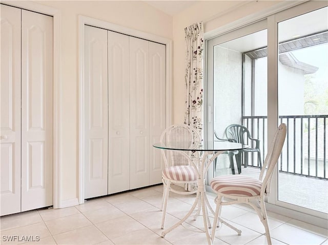 dining space with light tile patterned floors