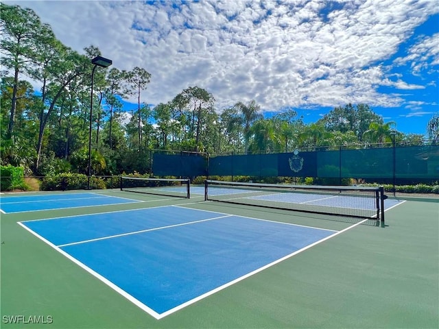 view of tennis court with basketball court