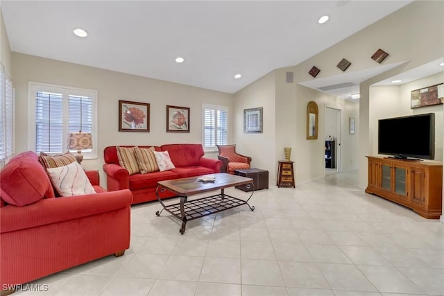 tiled living room with vaulted ceiling