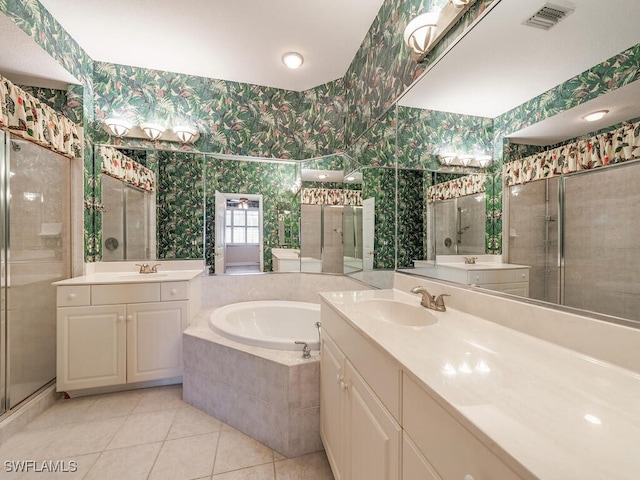 bathroom featuring vanity, tile patterned flooring, and independent shower and bath