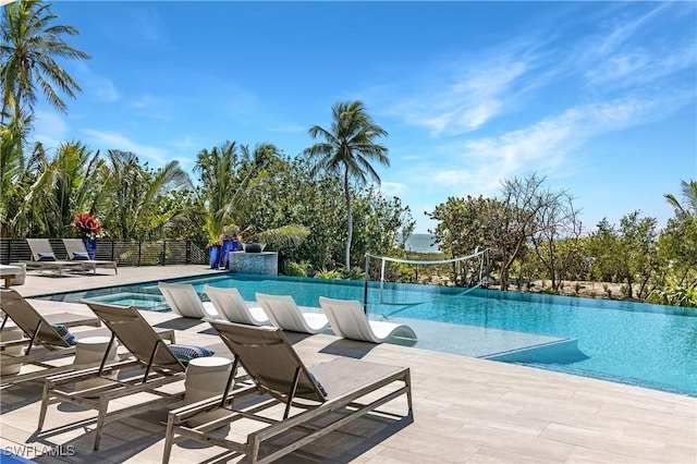 view of pool featuring a patio