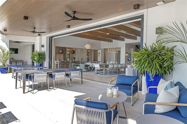 view of patio / terrace with ceiling fan and outdoor lounge area