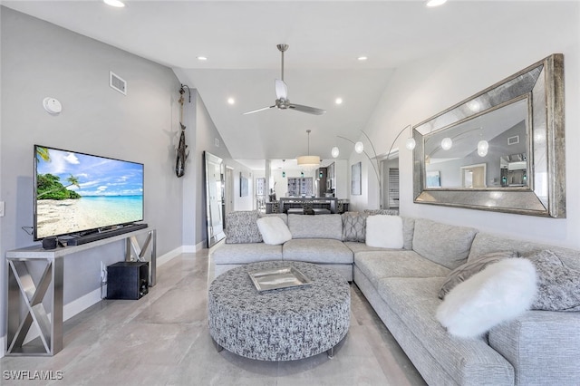 living room with ceiling fan and high vaulted ceiling