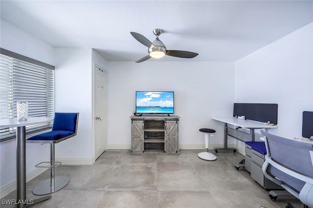 office area with ceiling fan