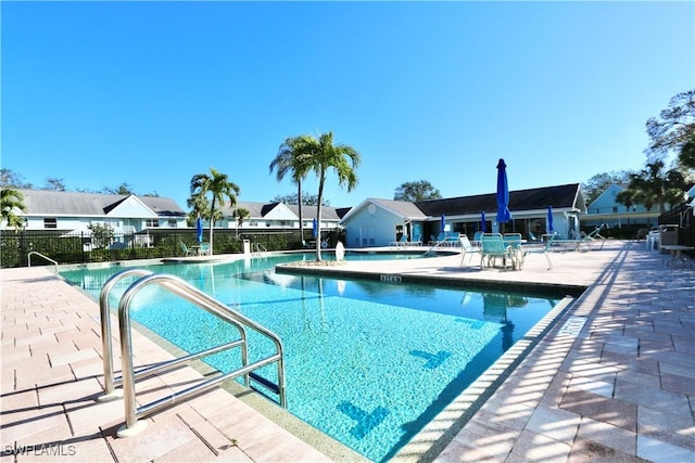 view of swimming pool featuring a patio