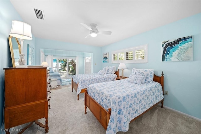 bedroom with access to outside, light carpet, and ceiling fan