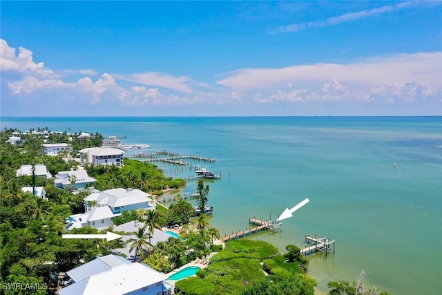 bird's eye view with a water view