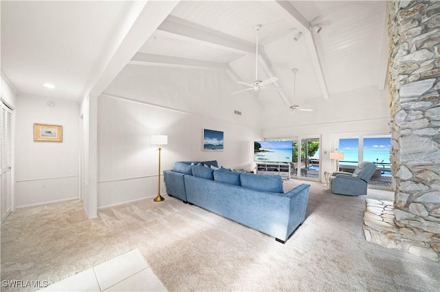 living room with high vaulted ceiling, beamed ceiling, light colored carpet, and ceiling fan