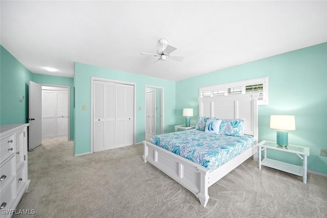 bedroom featuring light carpet and ceiling fan