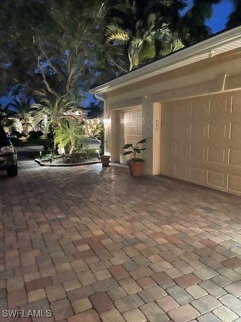 view of patio / terrace with a garage