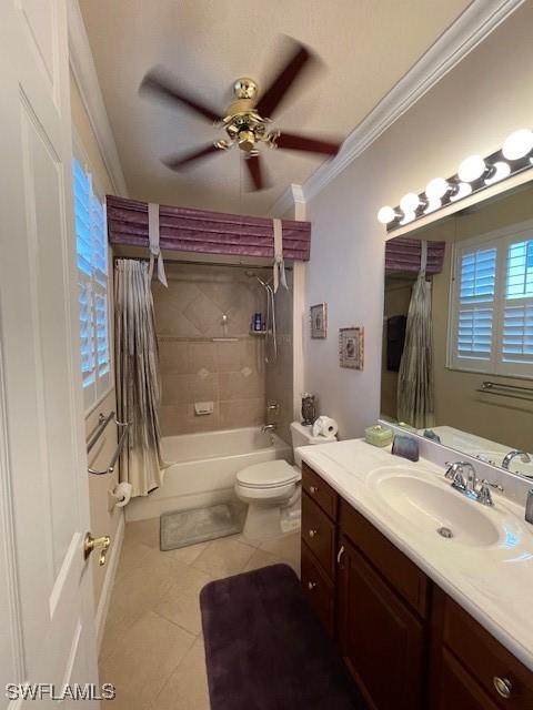 full bathroom featuring shower / bathtub combination with curtain, tile patterned flooring, ceiling fan, vanity, and crown molding