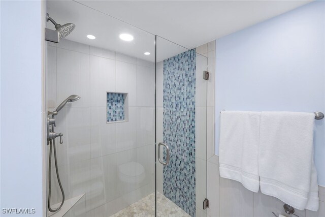 bathroom with an enclosed shower