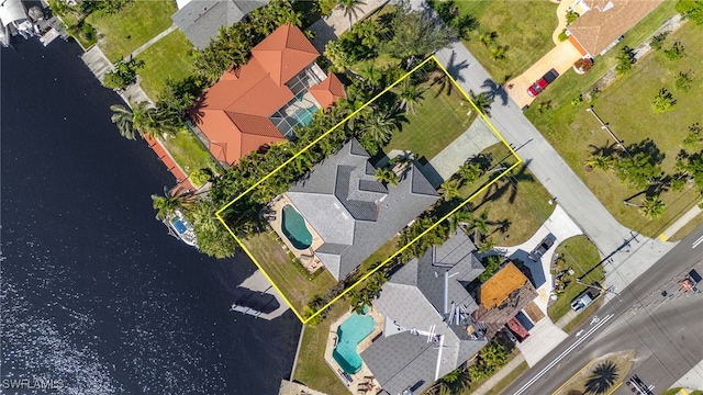 bird's eye view with a water view