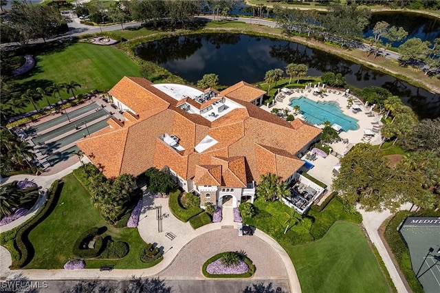 birds eye view of property featuring a water view