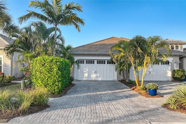 view of front of property with a garage