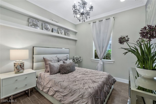 bedroom with ornamental molding and a notable chandelier