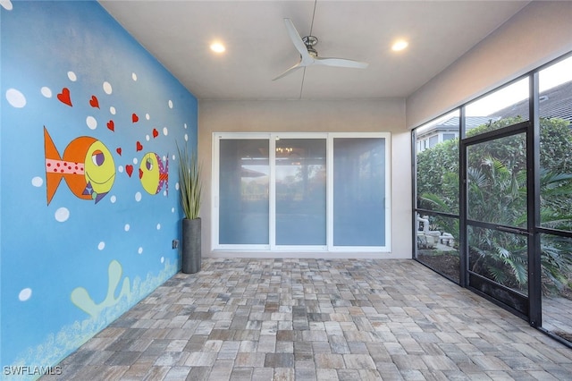 spare room featuring ceiling fan