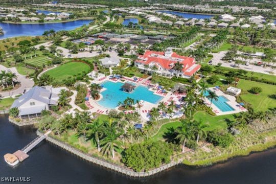 drone / aerial view with a water view