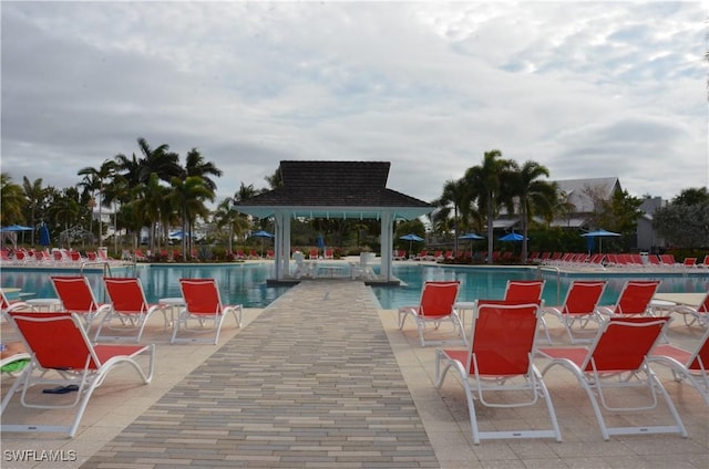 view of swimming pool featuring a gazebo and a patio