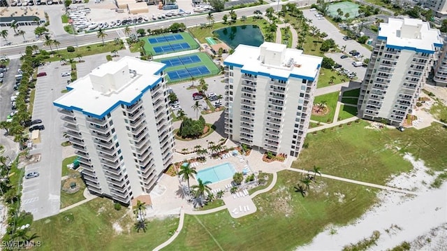 7300 Estero Blvd Unit 308, Fort Myers Beach, FL 33931 - drone / aerial view of a pool area and apartment complex